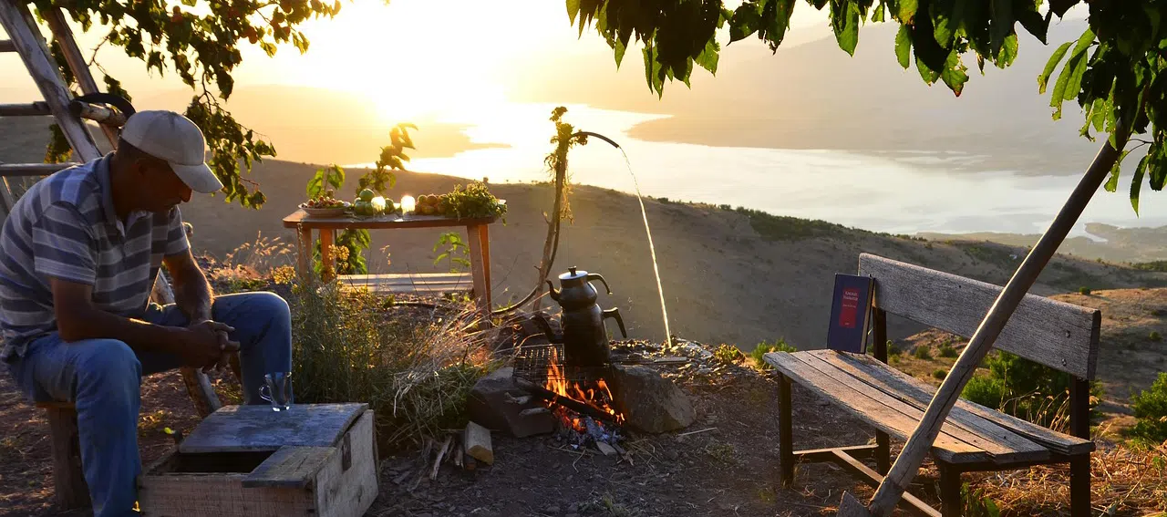 Male at serene campsite